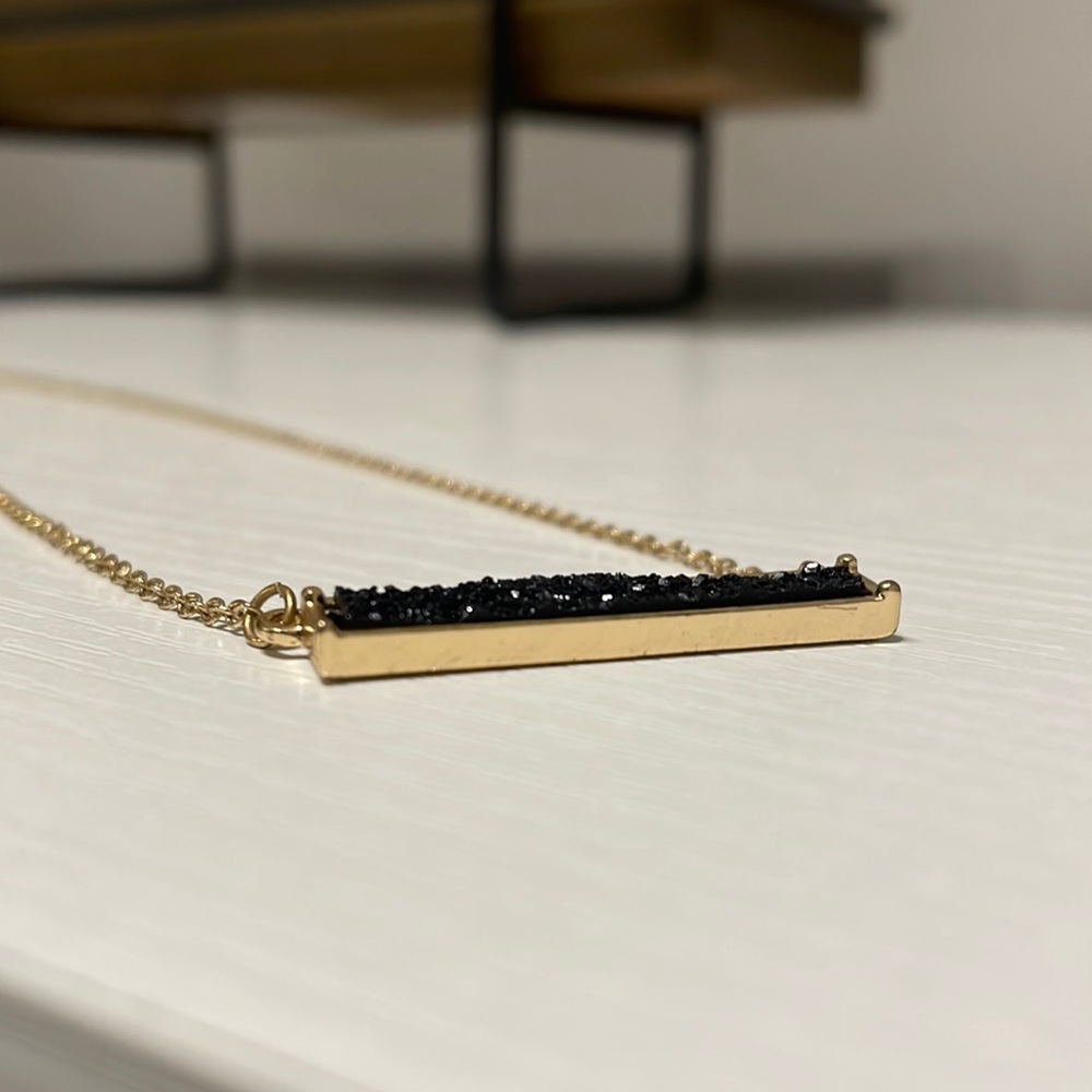 Gold and black necklace